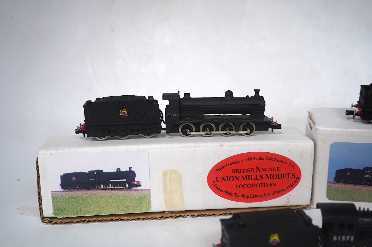 Three boxed Union Mills Models N gauge railway BR locomotives; a Class B12/3, 61572, a Class J39, 64736, and a Class Q2, 63344. Condition - good.